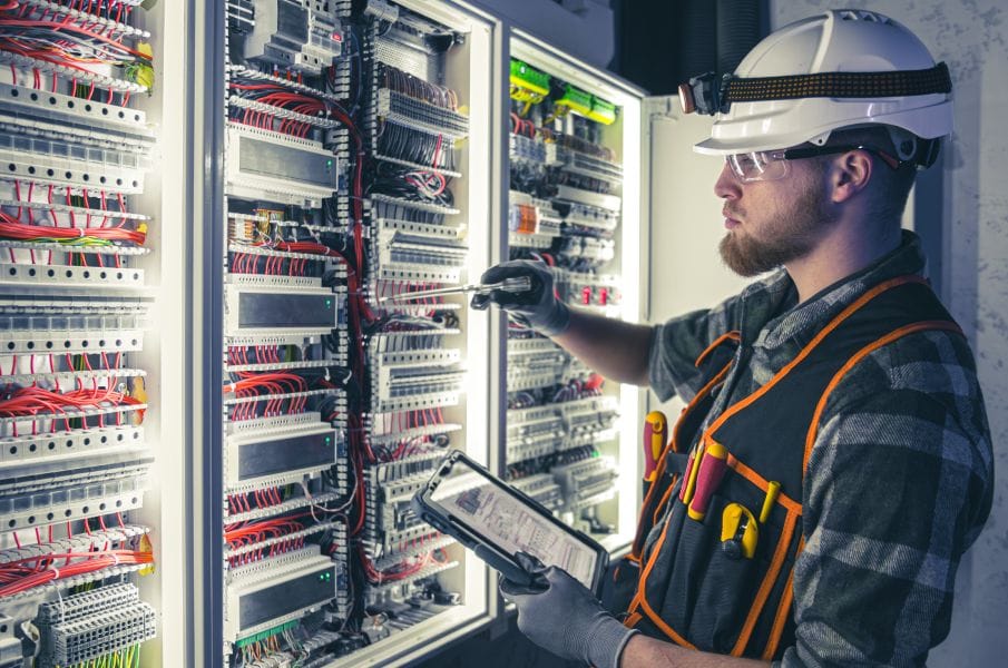 Commercial electrical installation with conduit, panels, and distribution equipment