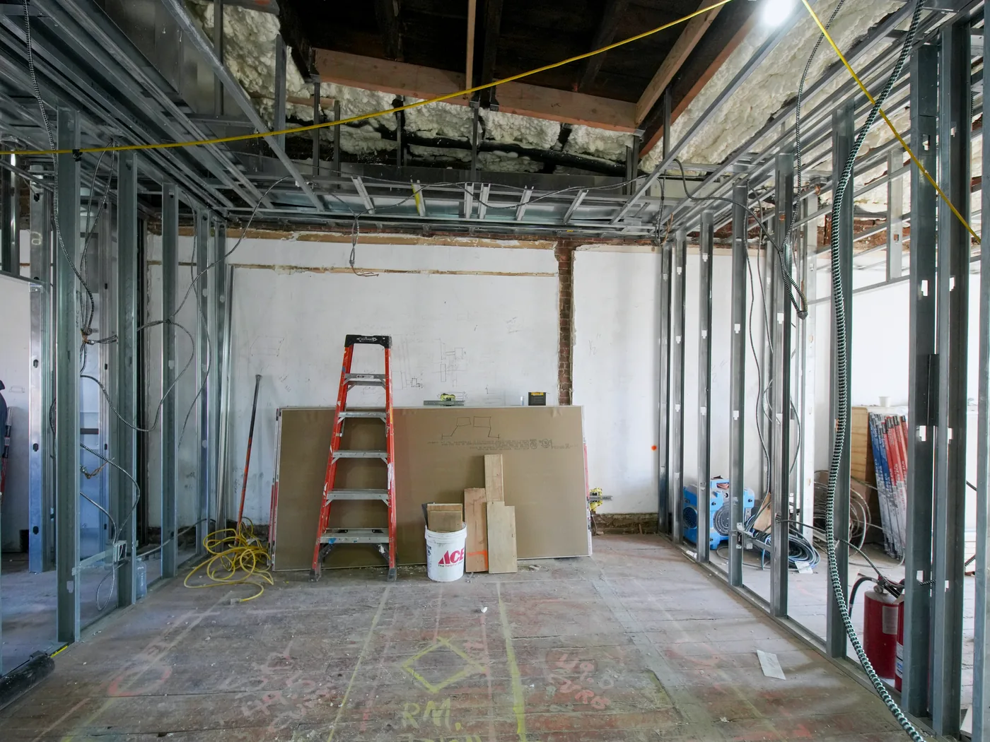 Commercial interior with metal framing, soffits, and coordinated ceiling services
