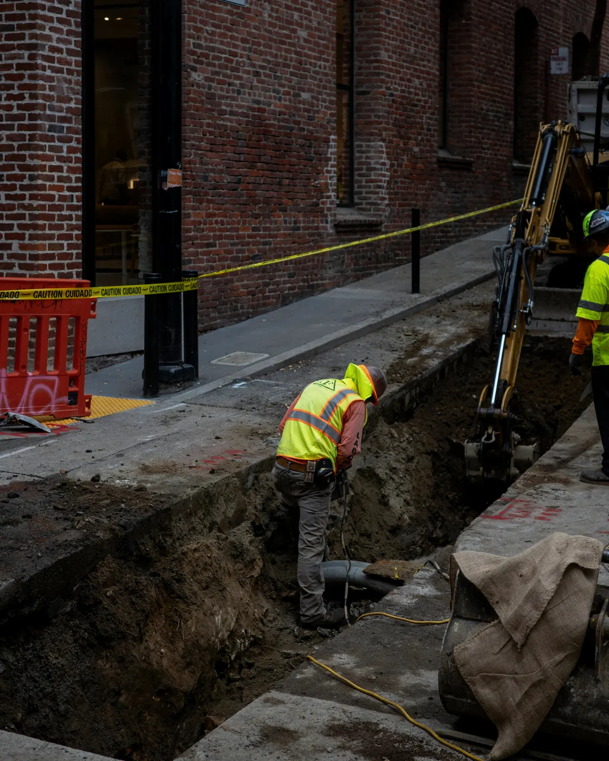 Civil grading plans, survey stakes, and earthwork quantities under review