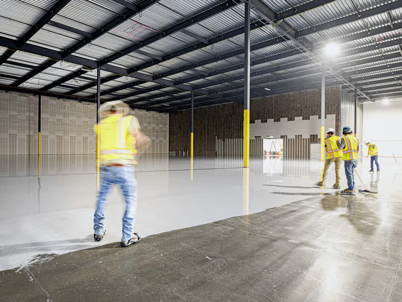 Commercial interior with multiple flooring types, transitions, patterns, and base conditions