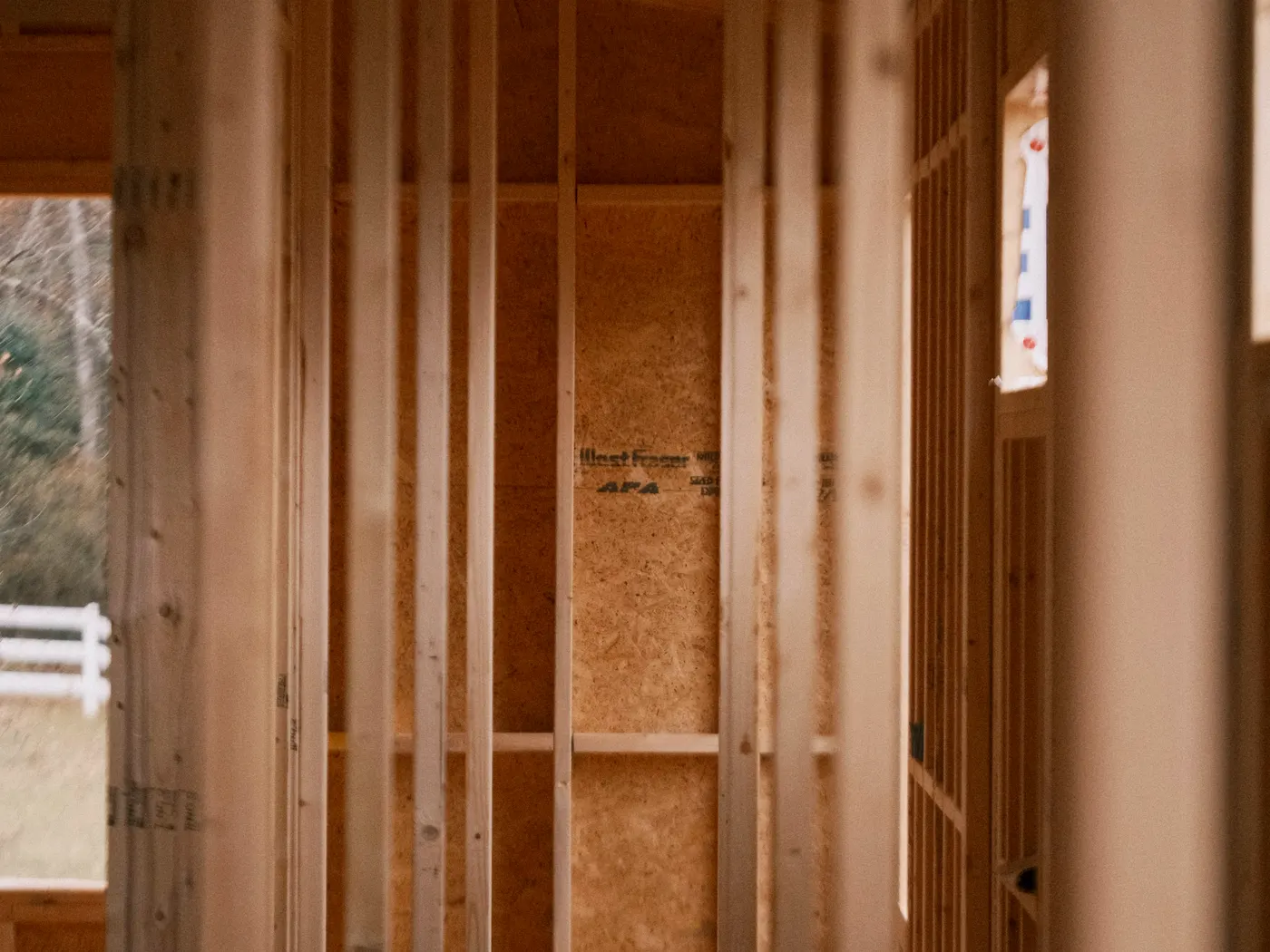 Building envelope with insulation, membranes, openings, transitions, and below-grade waterproofing