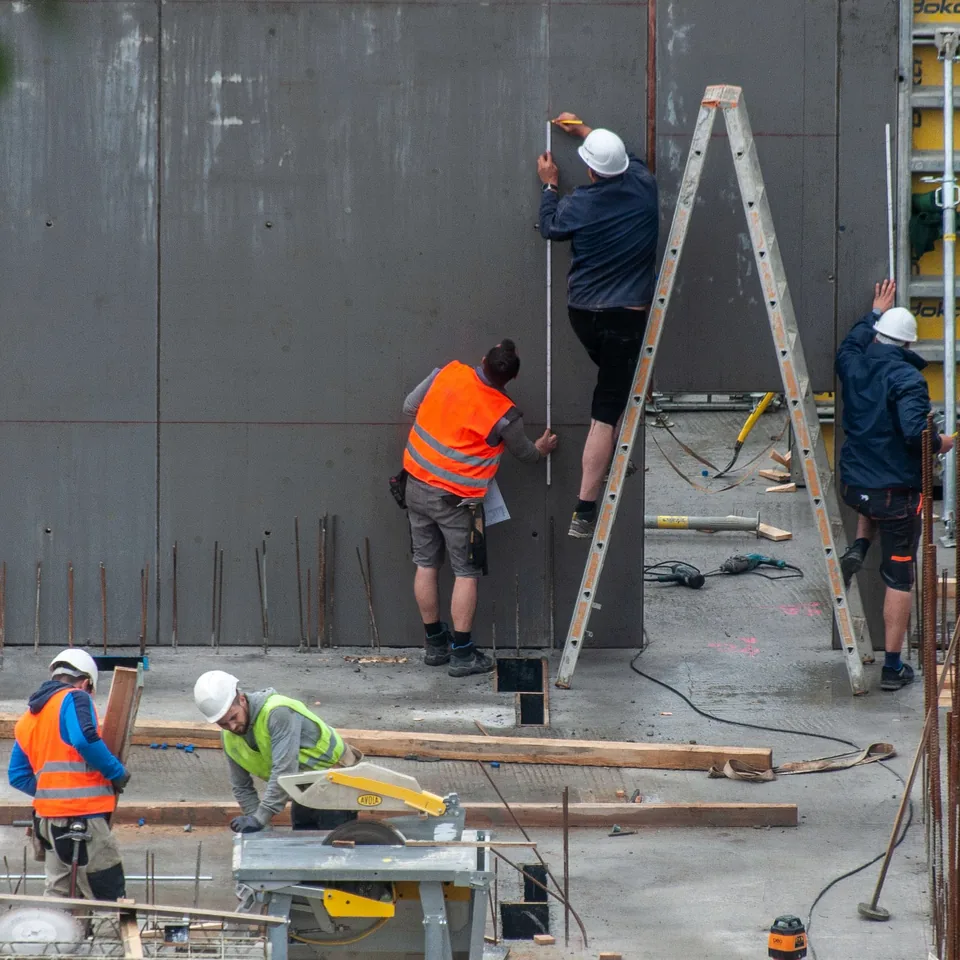 Construction crew performing field work used for labor-hour and cost planning