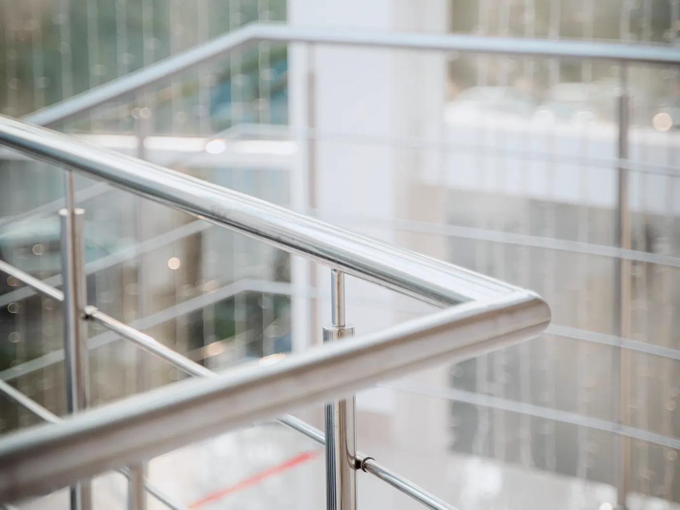 Commercial miscellaneous-metal work with stairs, railings, supports, embeds, and access constraints