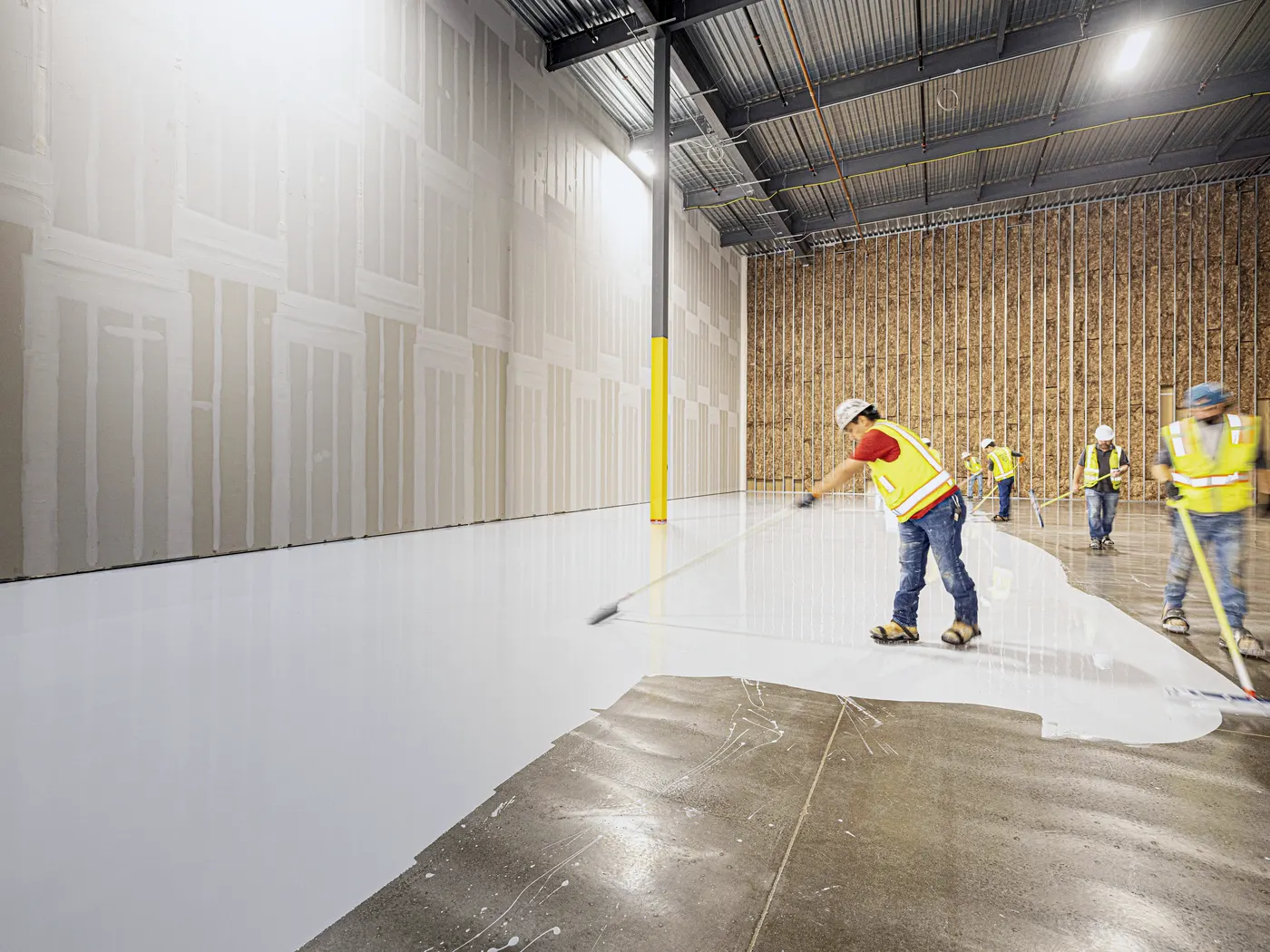 Commercial interior with varied substrates, doors, frames, exposed structure, and access conditions