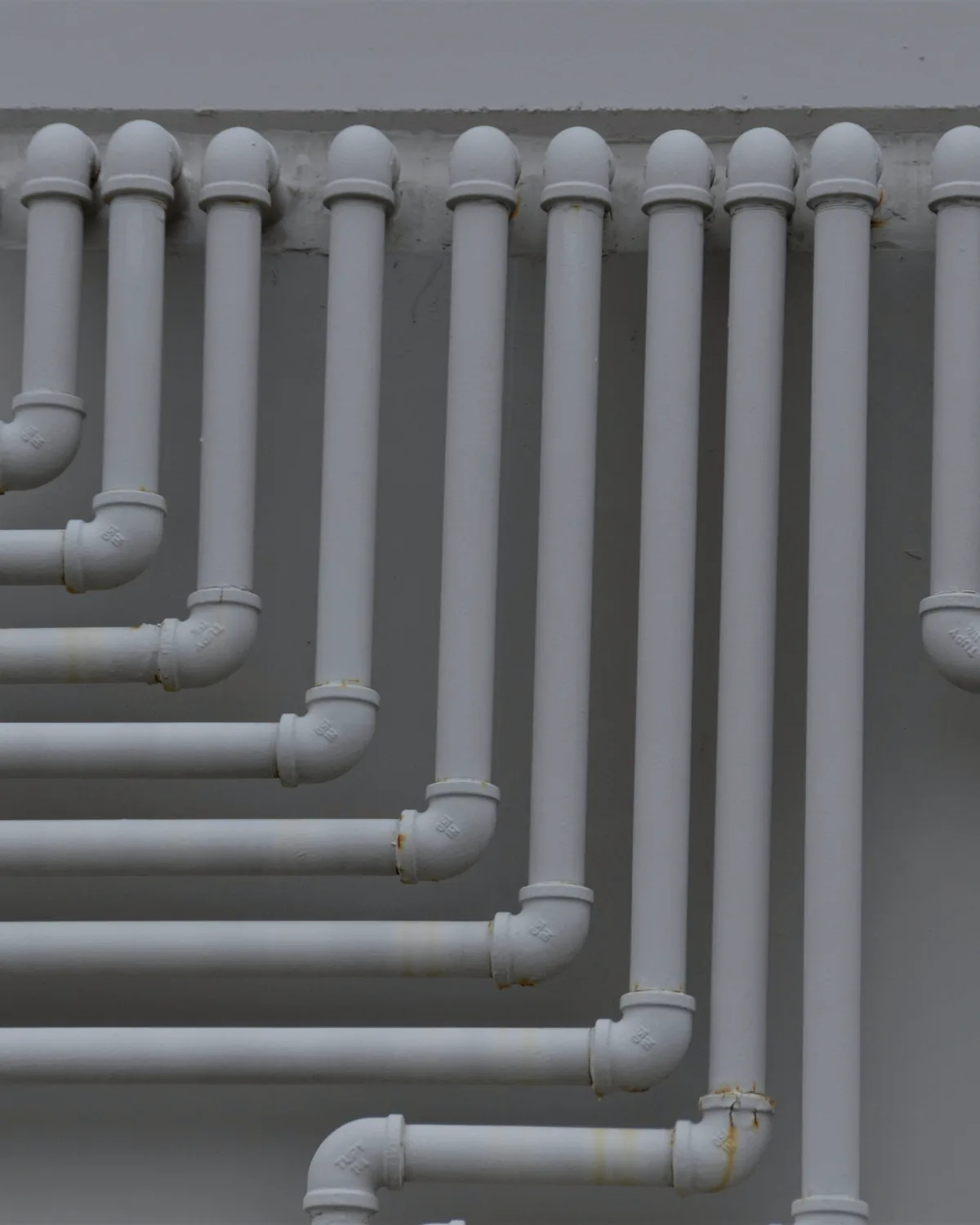 Plumbing plans, riser diagrams, fittings, valves, and fixture schedule quantities